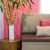 Modern living room with sofa and vase of Lucky bamboo